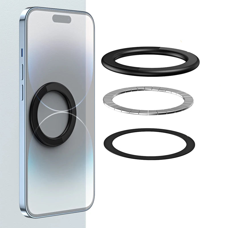 Black magnetic phone ring attachment shown exploded with a metallic ring and adhesive pad for smartphone mounting.