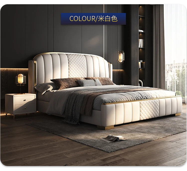 A minimalist, off-white upholstered bed frame featuring a curved headboard with vertical channel and diamond quilting.