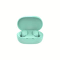 Mint green wireless earbuds in an open, oval-shaped matching charging case against a plain white background.