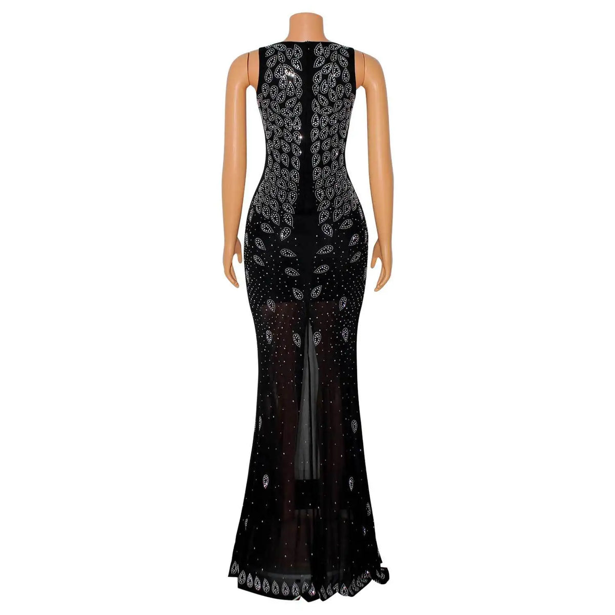 Black floor-length sheer mesh dress featuring intricate sparkling rhinestone patterns, a high back slit, and a sleeveless silhouette.