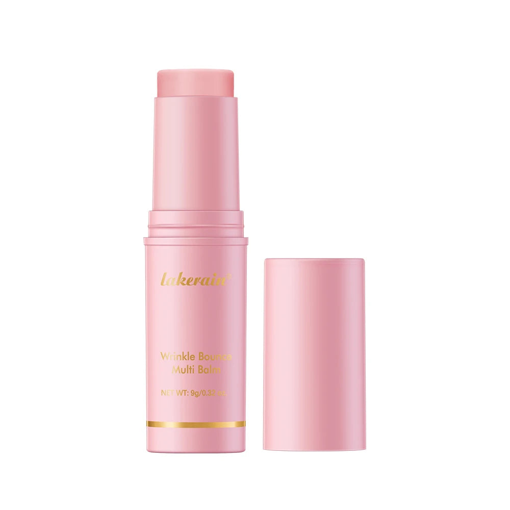 Pink twist-up wrinkle bounce multi-balm stick with a removable cap, in a sleek, compact design.