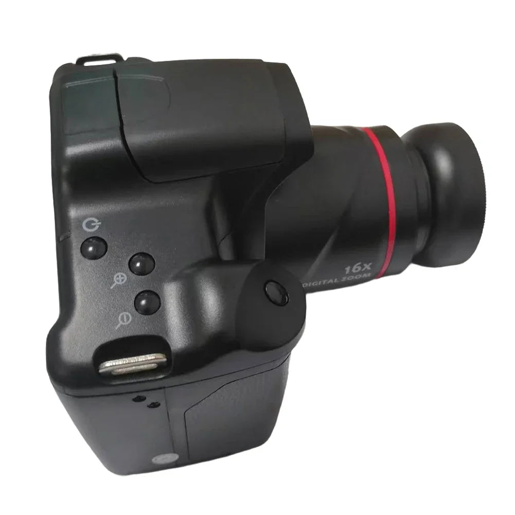 Black plastic digital camera with a 16x zoom lens, featuring a red ring and control buttons on the top.