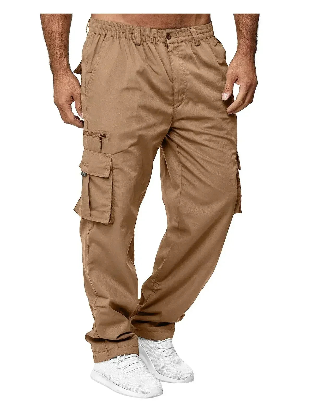 Men's tan cargo trousers with an elasticated waistband, side pockets and zip detailing, styled with white trainers.