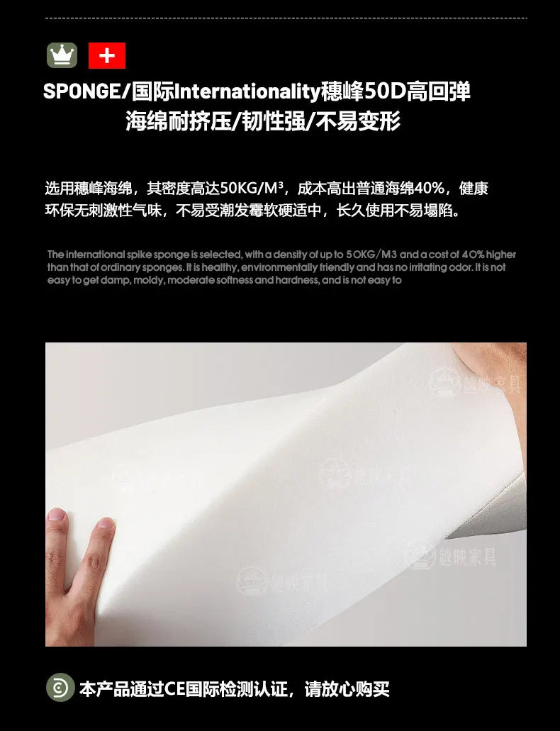 A close-up of a hand pressing into high-density, white, premium sponge padding for a luxury leather bed.