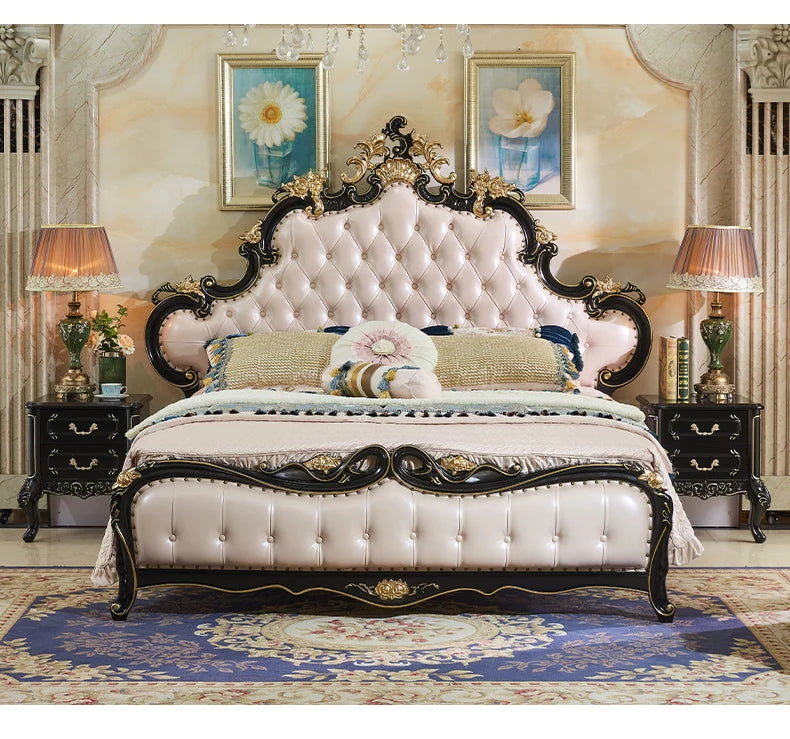 Ornate double bed with a cream tufted leather headboard, black wood frame, and intricate gold detailing.