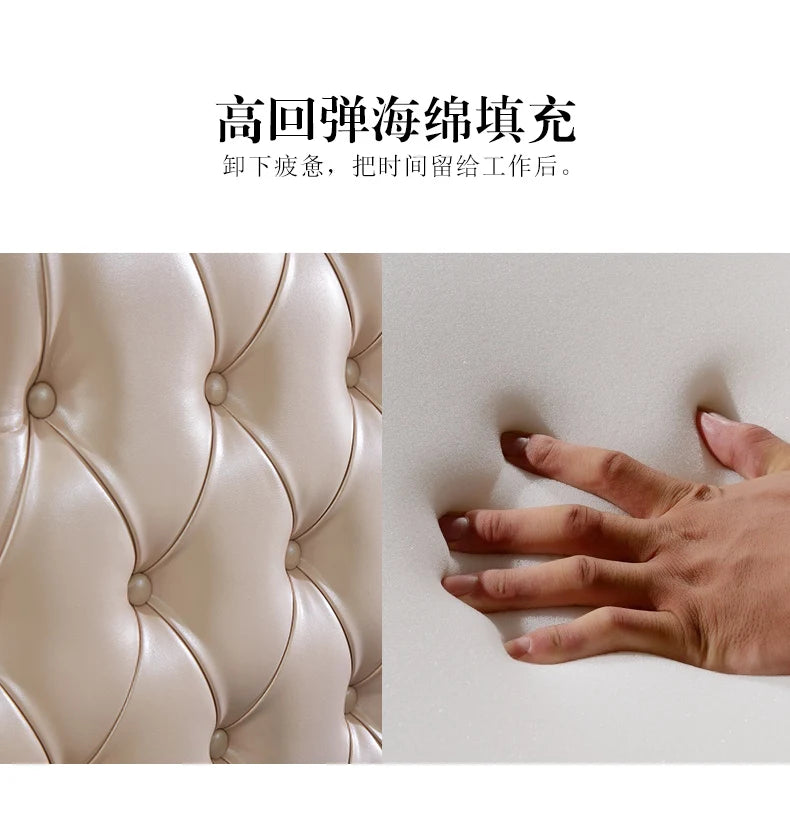 Close-up of a cream-coloured, button-tufted padded headboard and a hand pressing into high-density foam filling.