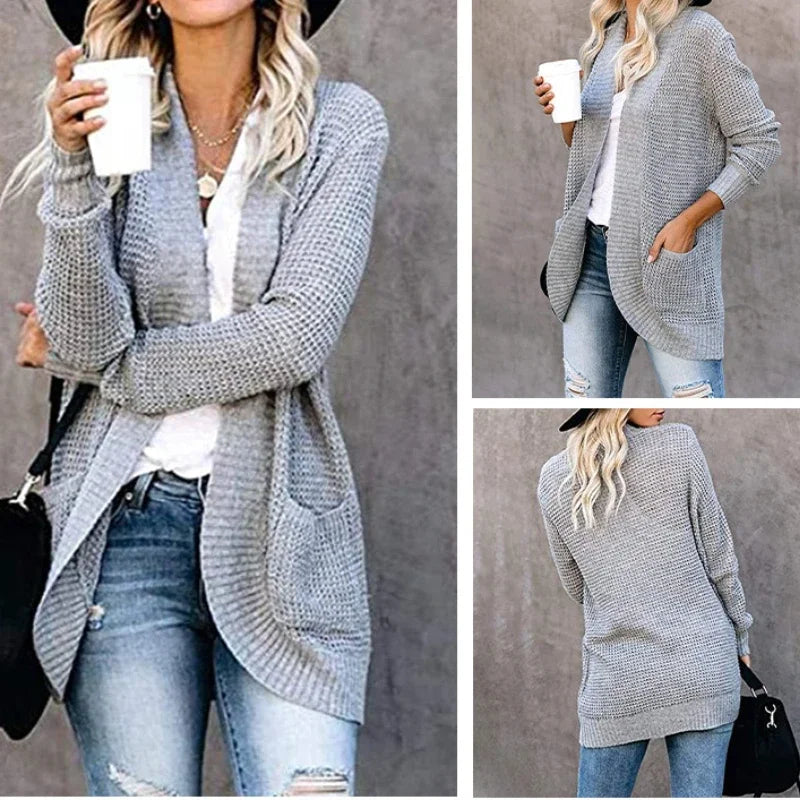 Grey open-front knit cardigan sweater with long sleeves, ribbed trim, and front pockets.