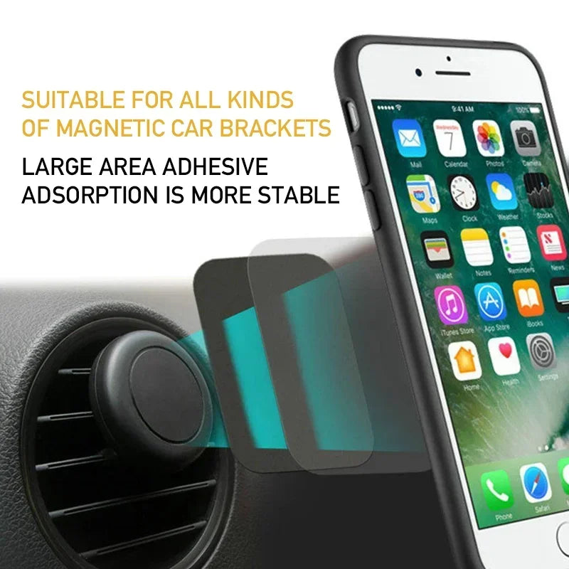Black magnetic phone mount attached to a car air vent, holding a smartphone with an adhesive metal plate on its back.