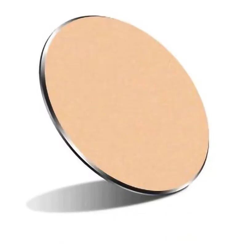 A circular, light peach-colored makeup powder refill with a sleek, minimalist design.