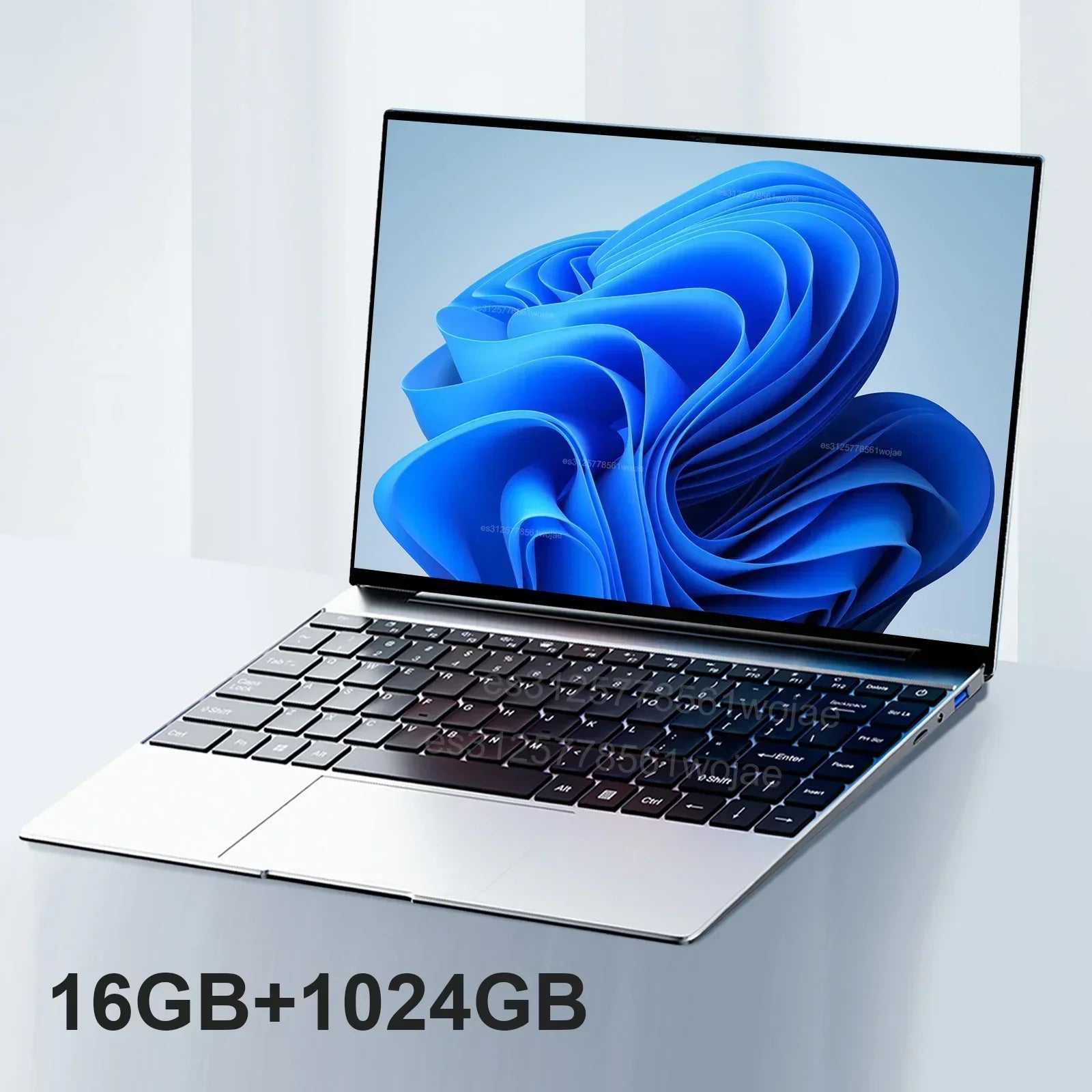 Sleek silver 14.1-inch ultra-slim laptop with a thin-bezel screen, black keyboard, and Windows 11 interface.