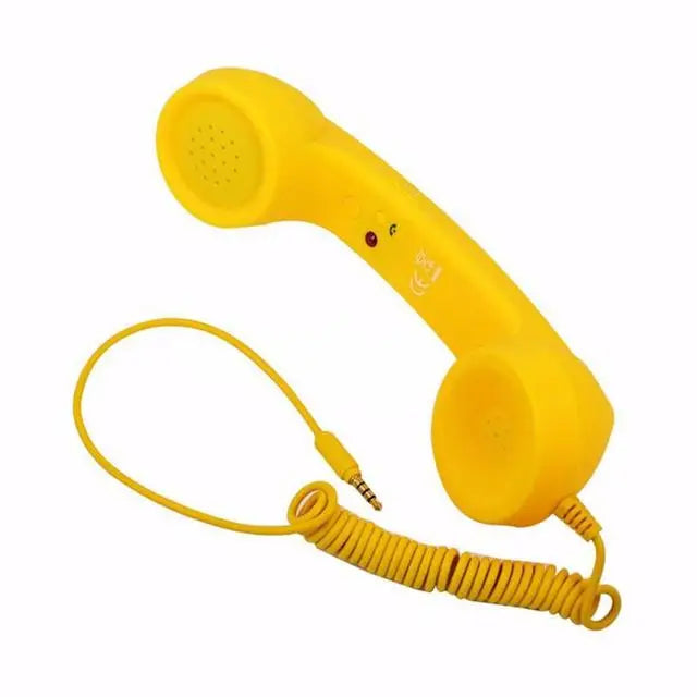 Bright yellow retro-style telephone handset with a coiled cable and 3.5mm jack connector for mobile devices.