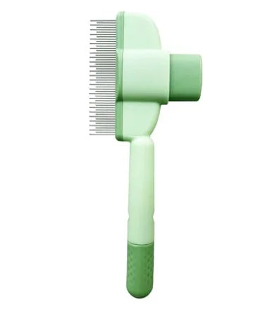 Sage green pet grooming brush with fine metal teeth and a comfortable non-slip handle.