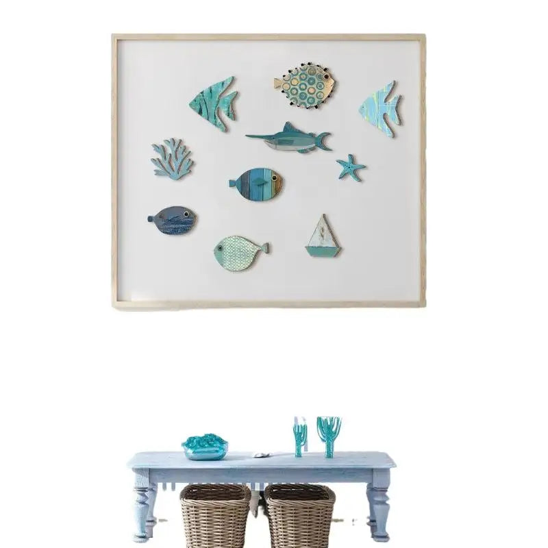 A framed 10-piece wooden wall art set featuring coastal motifs in shades of blue, including fish, coral, and a boat.