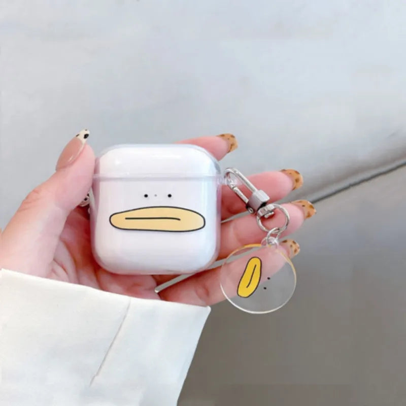 Clear, silicone AirPod case featuring a cute duck face, including a matching duck charm keyring.