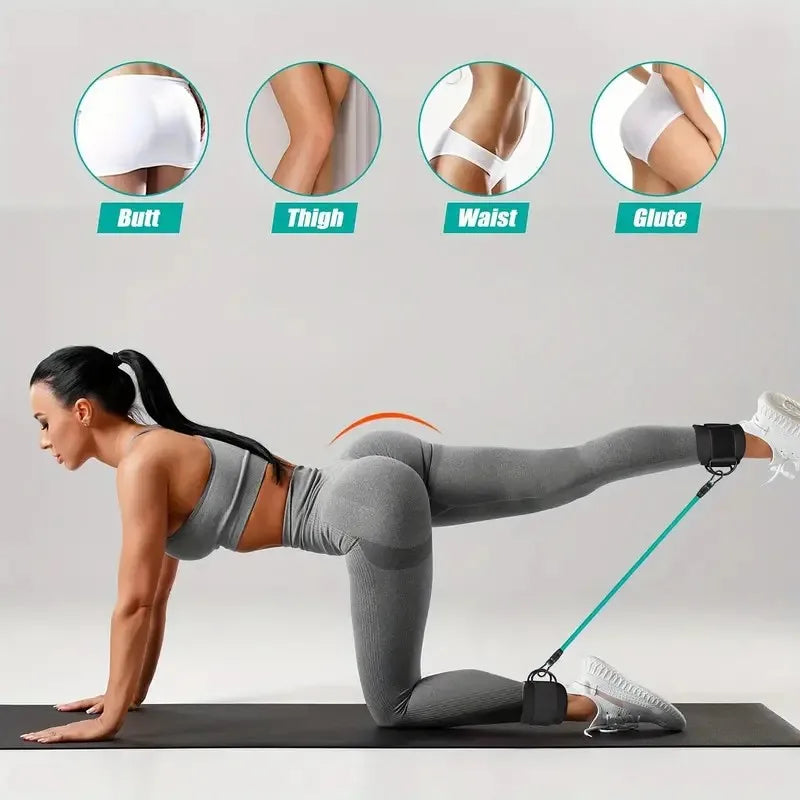 A woman in grey activewear uses a blue resistance band with black ankle straps for a glute kickback exercise.