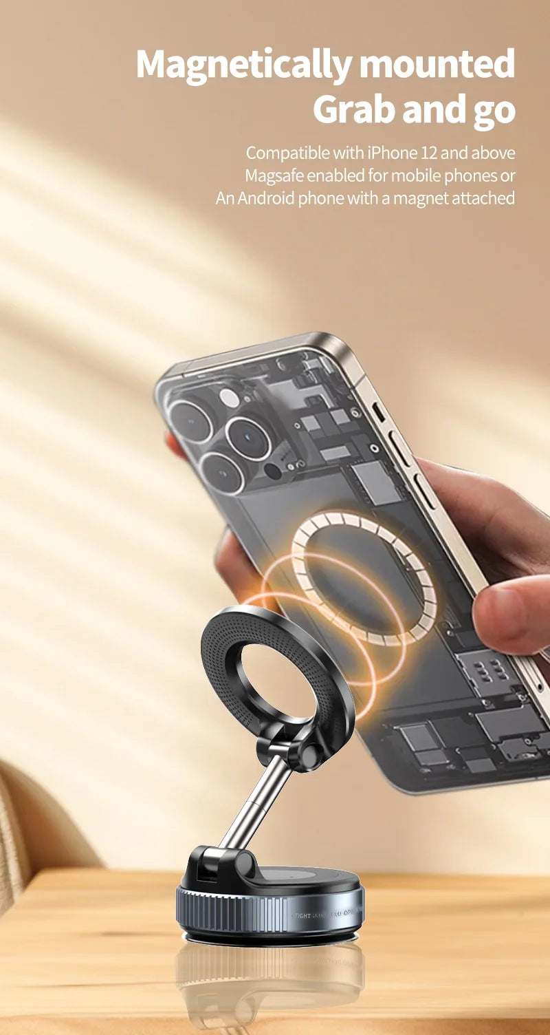Black and silver magnetic phone stand holding a smartphone with a visible internal ring design.