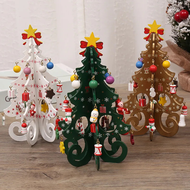Three wooden Christmas tree ornaments in white, green, and gold, featuring snowflake patterns and hanging decorations.
