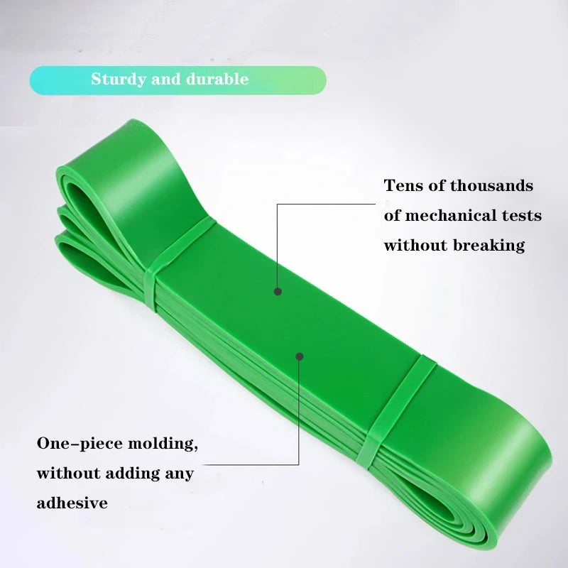 A durable, bright green, seamless one-piece resistance exercise band, perfect for Pilates and gym workouts.