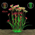 Artificial 40cm aquarium plant with tall stems, green grassy base, and heart-shaped pink and green leaves on black.