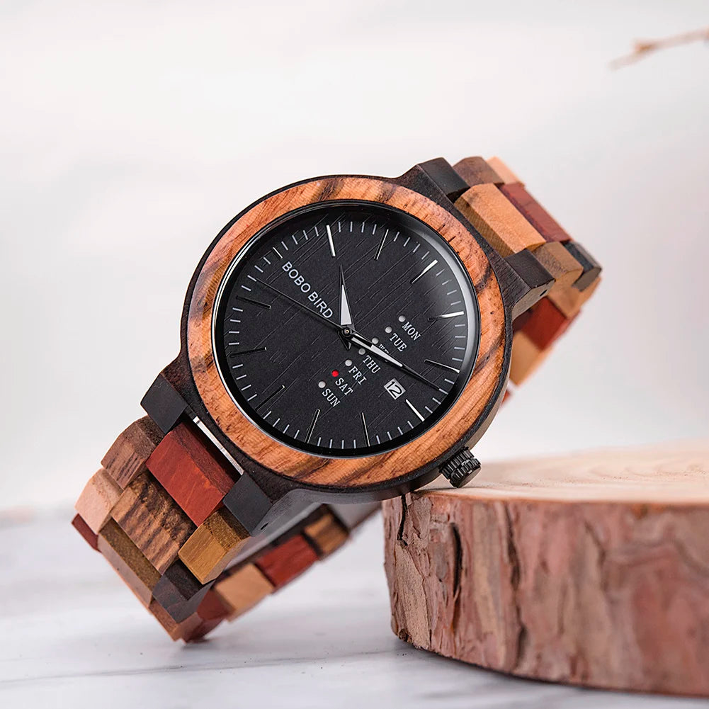 BOBO BIRD wooden watch with round brown wood bezel, black face, day-date display, and multicolored link bracelet.