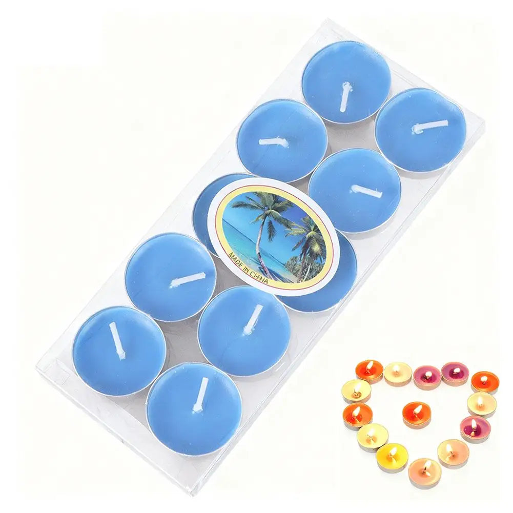 Pack of ten light blue tea light candles with a tropical beach label and lit candles in heart formation.