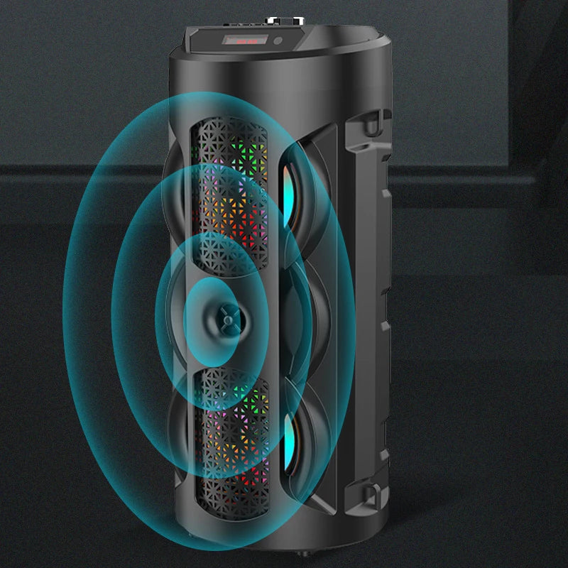 Portable black cylindrical Bluetooth speaker with LED-lit patterned grilles and a digital display on top.