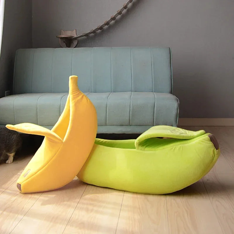 Soft plush banana-shaped pet bed in yellow and light green with peel-back top flap.