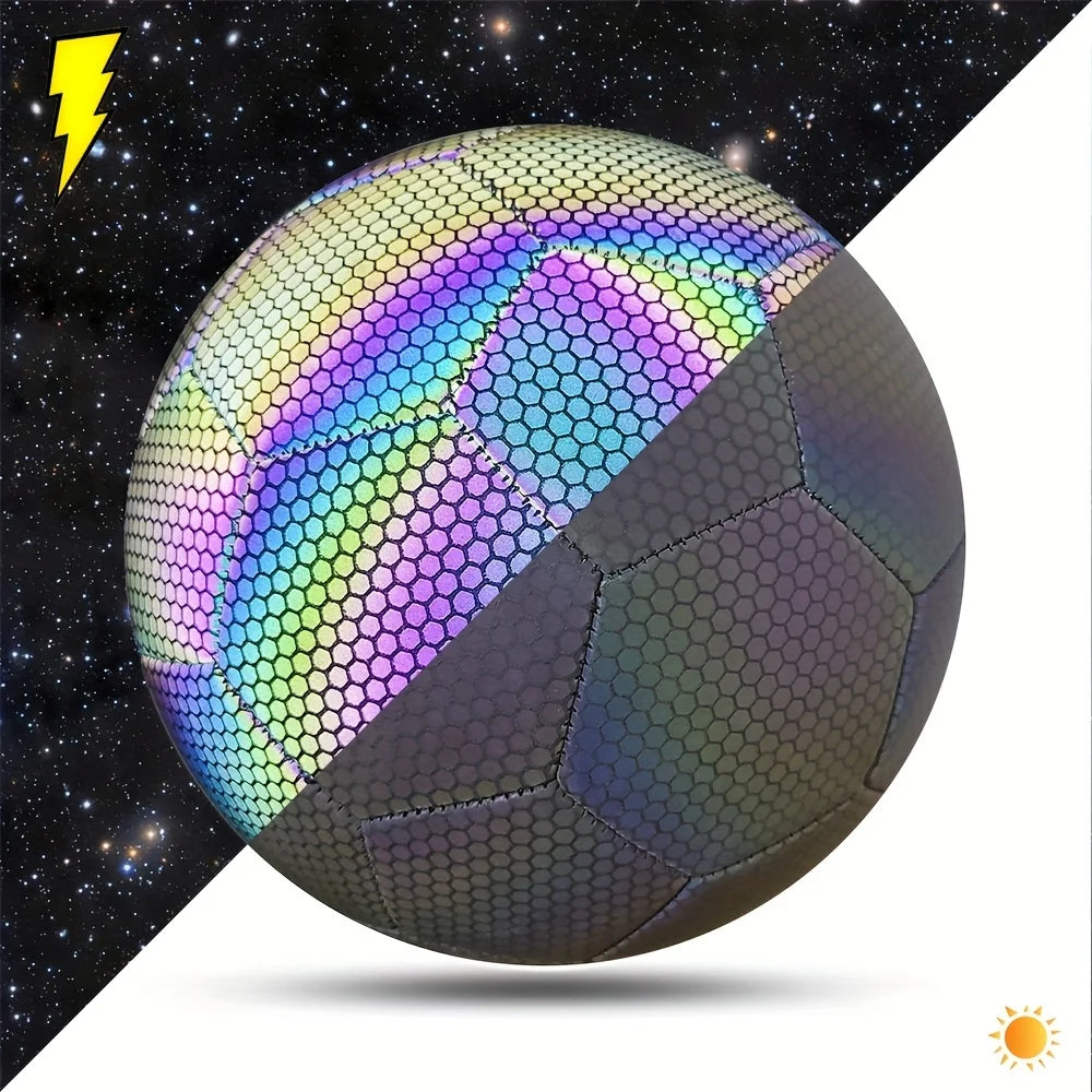 Reflective, holographic football with a hexagonal pattern that glows brightly in the dark.