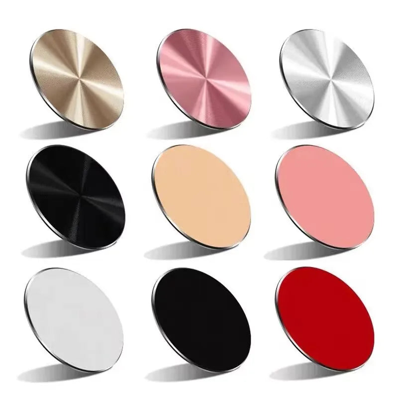 A collection of nine circular, metallic phone mounts in various solid and brushed finishes, arranged in a grid.