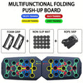 Black foldable push-up board with colour-coded workout slots, foam grips, non-slip mat, and a jump rope.