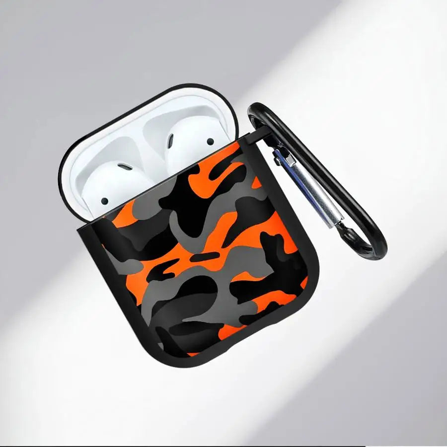 Orange, grey, and black camo print silicone protective case for AirPods 1 & 2, featuring a black carabiner clip.