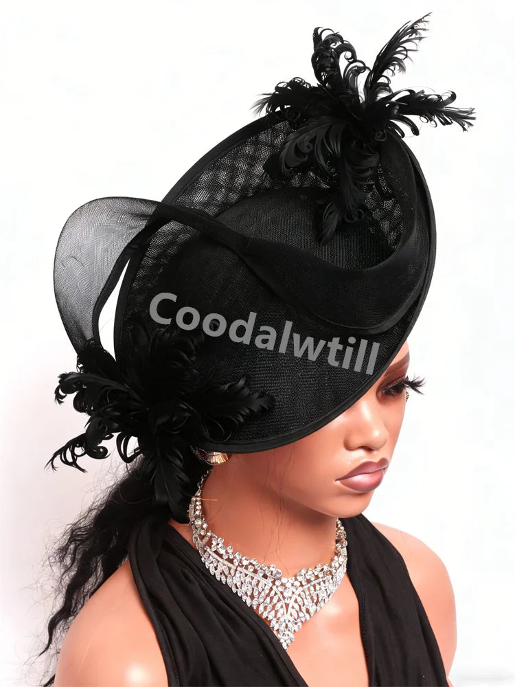 Elegant black fascinator with mesh detailing, feather accents, and a curved brim, worn by a mannequin.