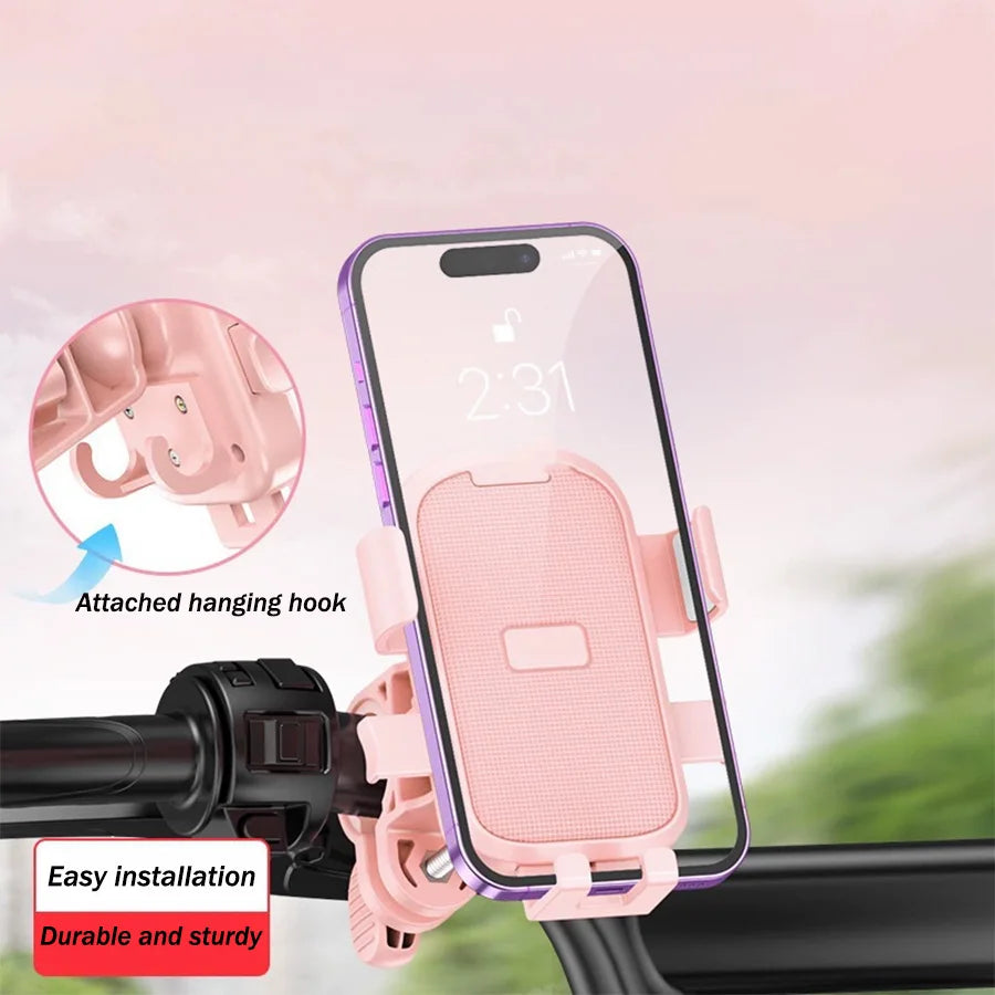 Pink bicycle phone mount with a secure clamp, sturdy grip, and an integrated hook for easy attachment to handlebars.