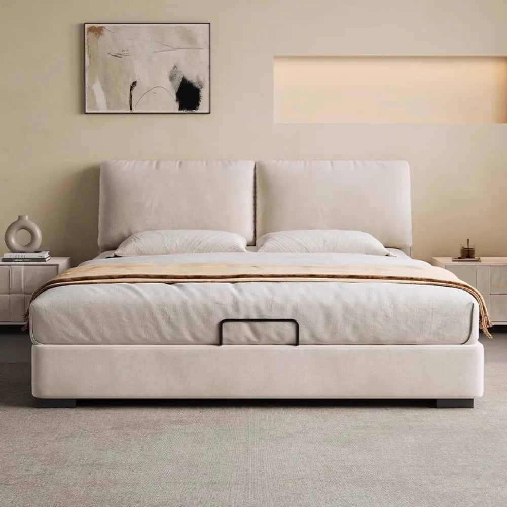 Modern cream 180x200cm storage bed with a plush, padded headboard and convenient central lifting handle.