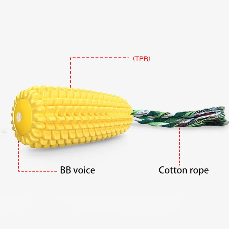 Yellow corn-shaped TPR chew toy with a squeaker and green-and-white braided cotton rope handle.