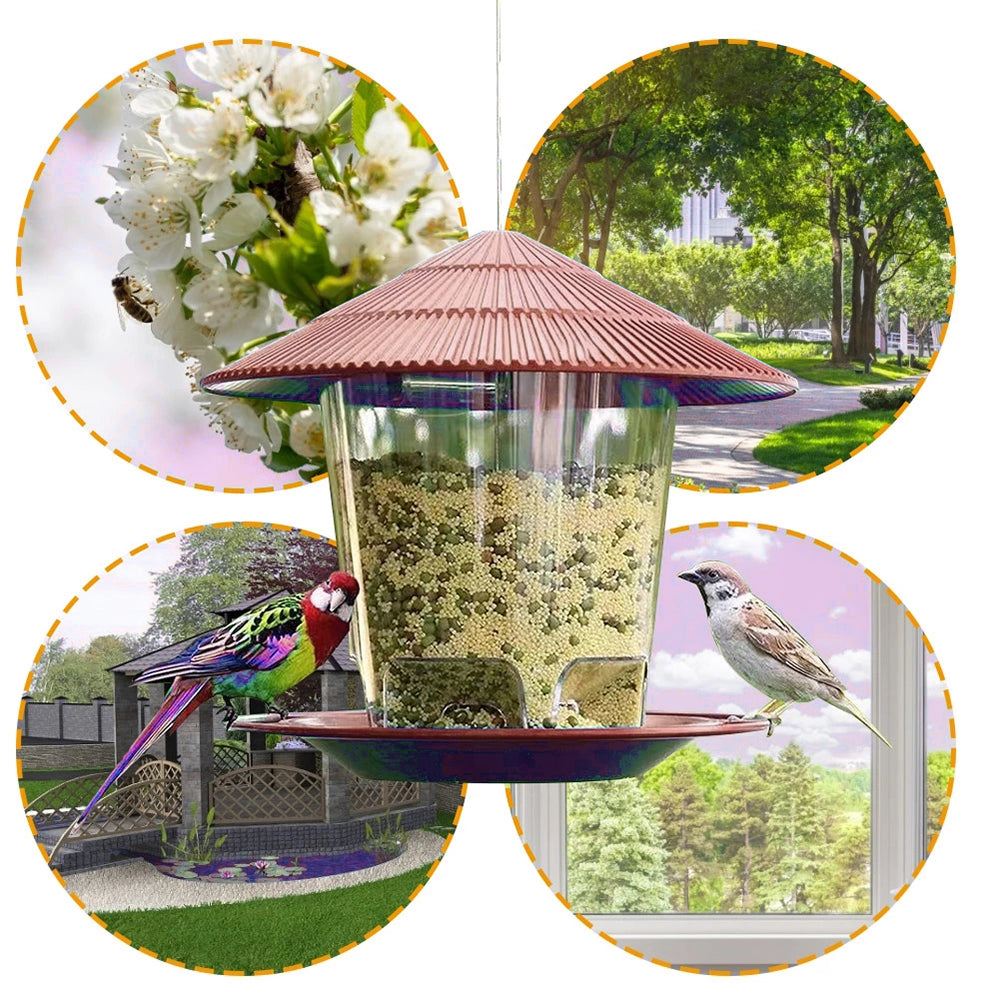 Hanging bird feeder with a maroon pagoda-style roof, clear seed container, and wide circular tray, filled with seeds.