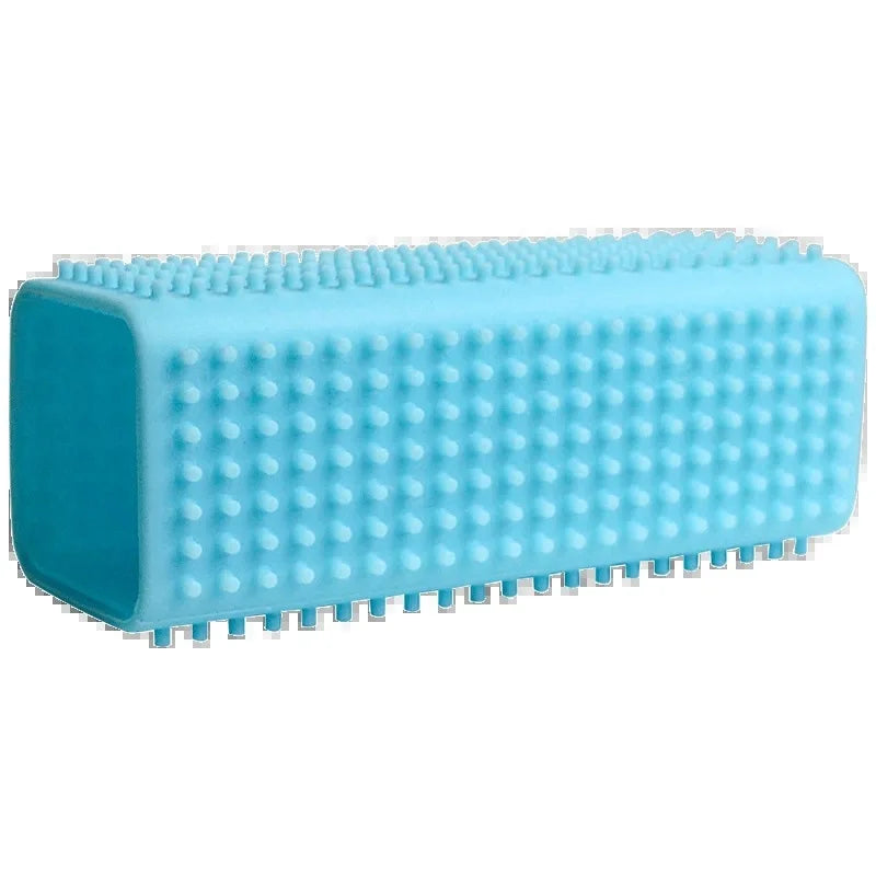 A bright blue rectangular silicone lint remover brush with a textured, studded surface.