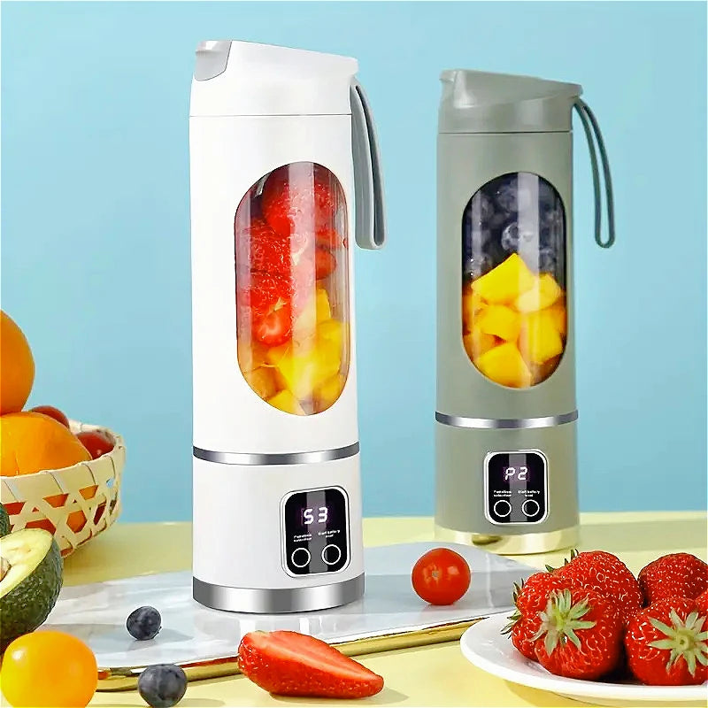 Two portable electric blenders, one white and one olive green, with digital displays and fruit-filled glass chambers.
