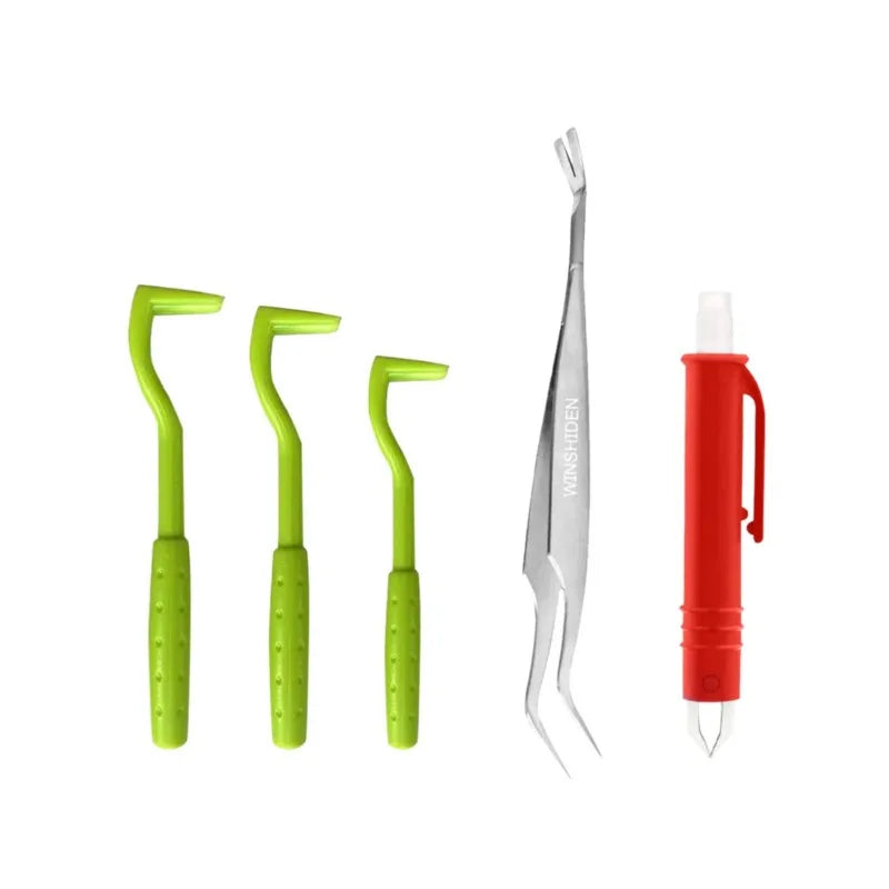 Set of five tick removal tools: three green hooked plastic tools, one metal tweezer, and one red pen-style tool.