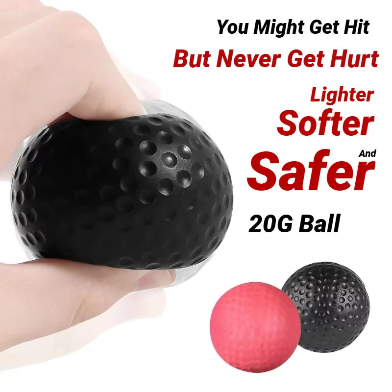 Hand squeezing a black, dimpled, soft foam reflex ball. A pink and a black ball are shown on the white background.