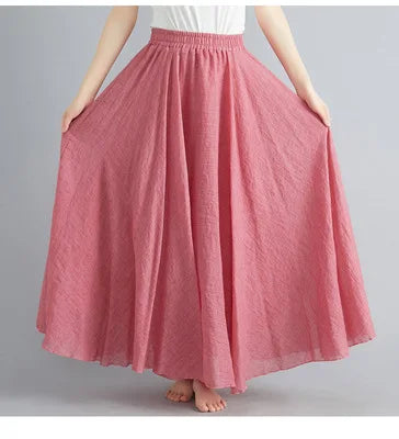 Dusty pink, pleated maxi skirt with a comfortable elasticated waistband and flowing, loose-fit design.