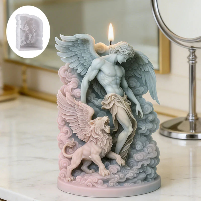 Sculpted candle showing a winged angel with a winged lion in ombre pink and blue pastel tones, with a lit wick.
