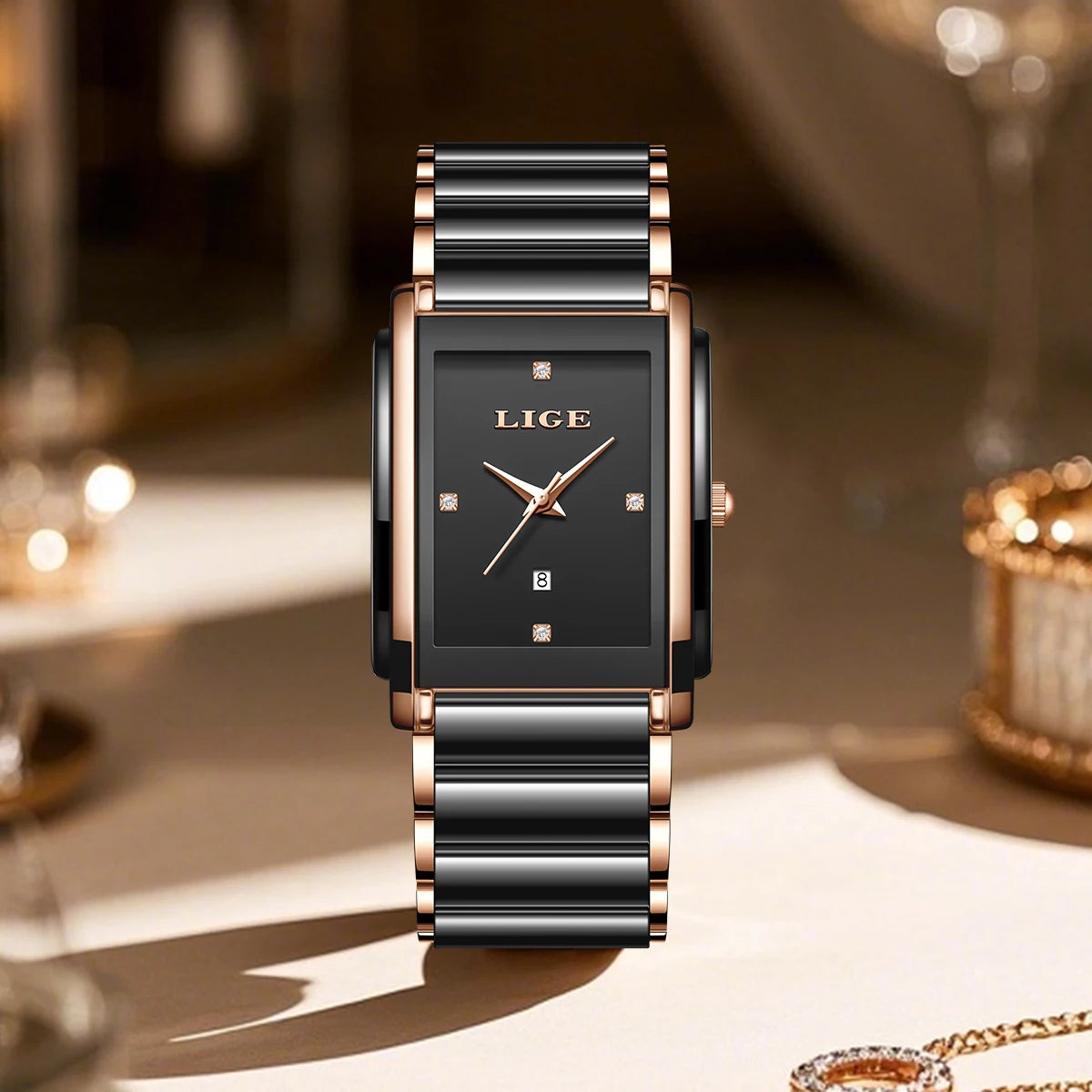 LIGE women's rectangular watch with black dial, rose gold accents, and black-and-gold ceramic strap.
