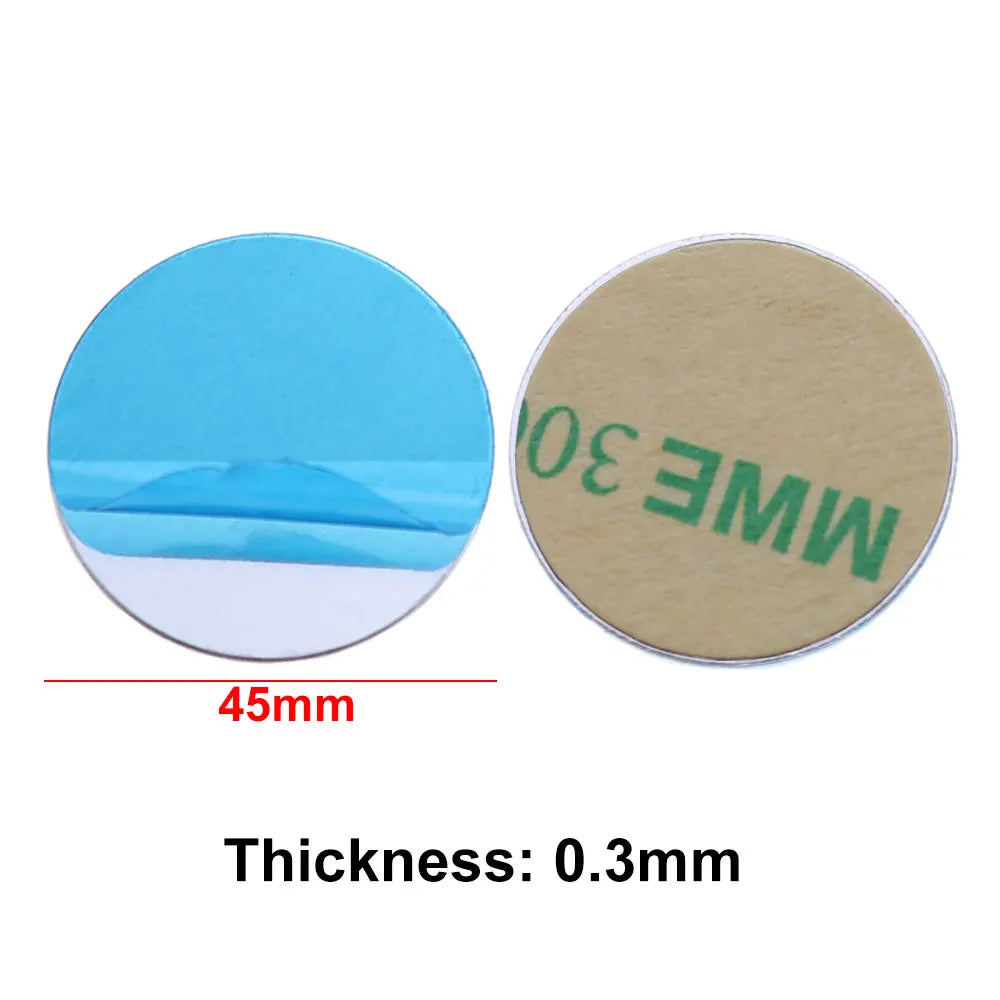 Two 45mm round adhesive metal plates. One side is light blue, the other has a beige backing with text. 0.3mm thick.