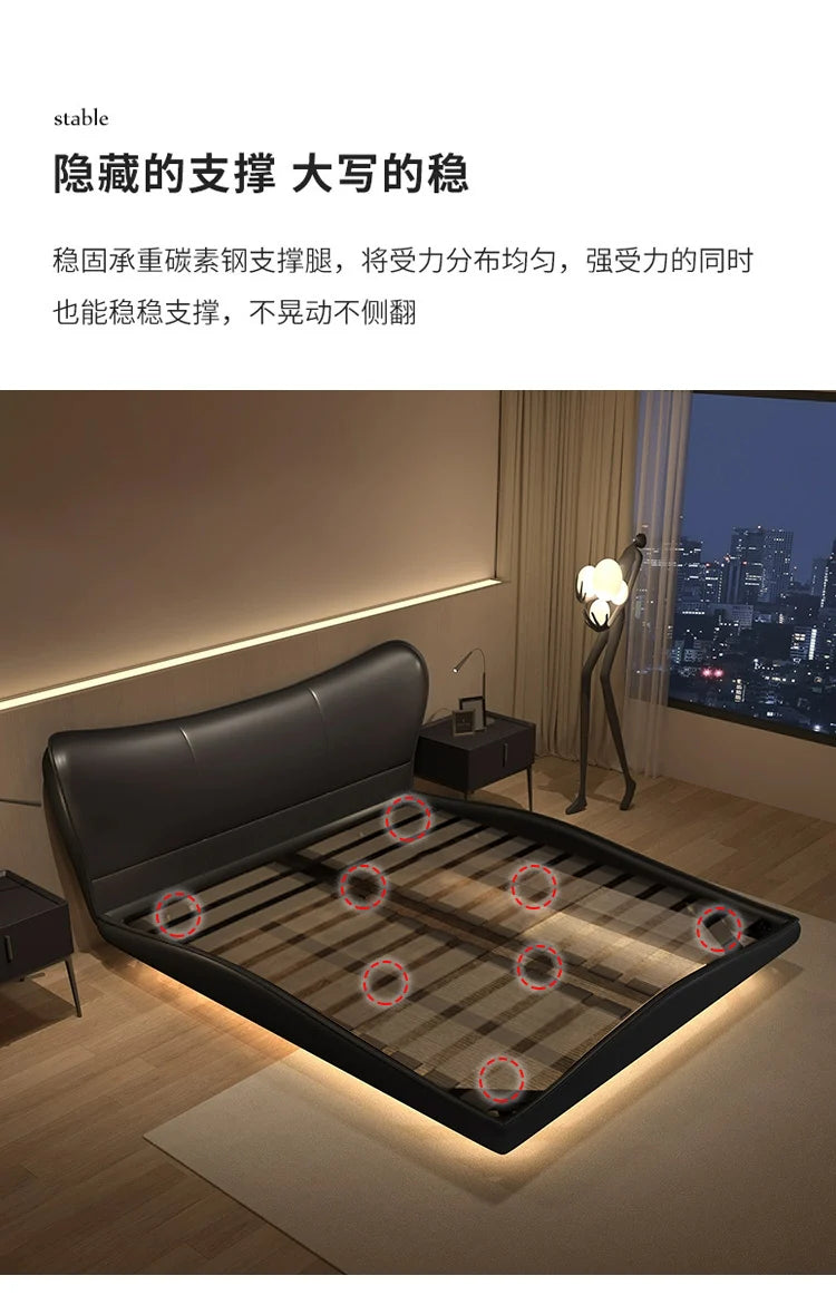 Modern black upholstered bed frame with a curved headboard and highlighted interior support legs for extra stability.