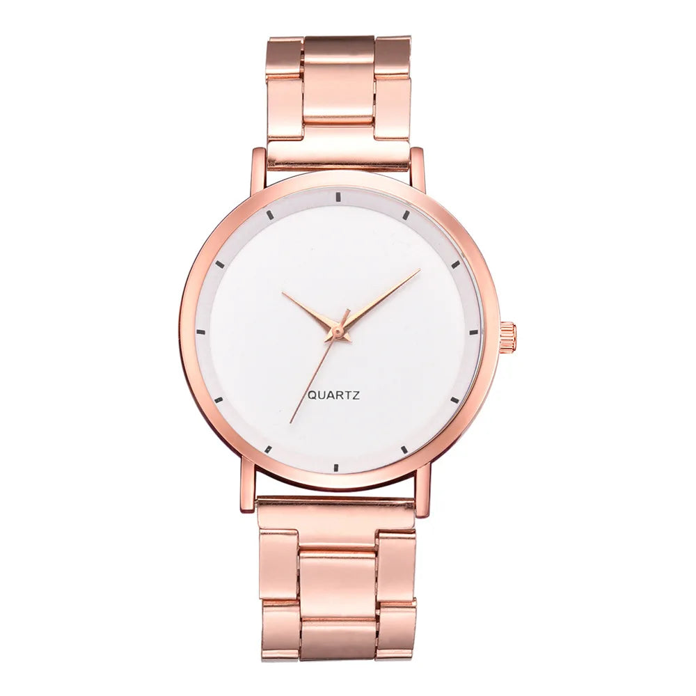 Elegant ladies' rose gold stainless steel watch with a minimalist white face and simple baton markers.