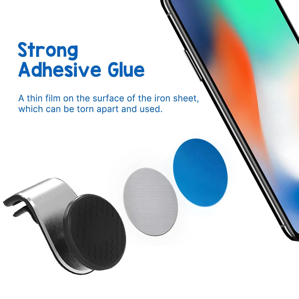 Magnetic car phone mount with a brushed silver finish, black circular grip, and adhesive iron mounting discs.