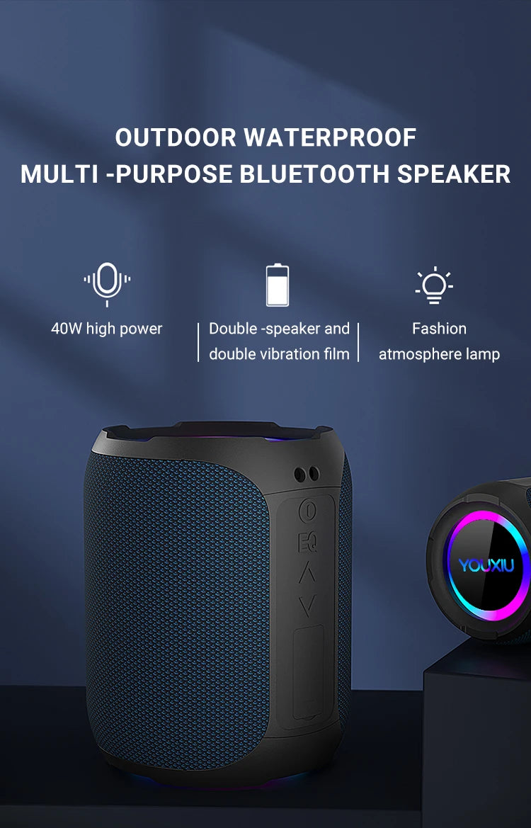 Blue fabric-covered portable 40W waterproof Bluetooth speaker with colourful LED light ring and side control buttons.