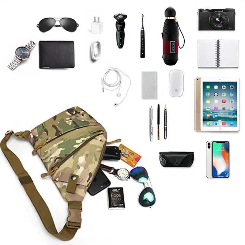 Camo-print crossbody sling bag with a secure strap, surrounded by everyday carry items like a tablet, phone, and wallet.
