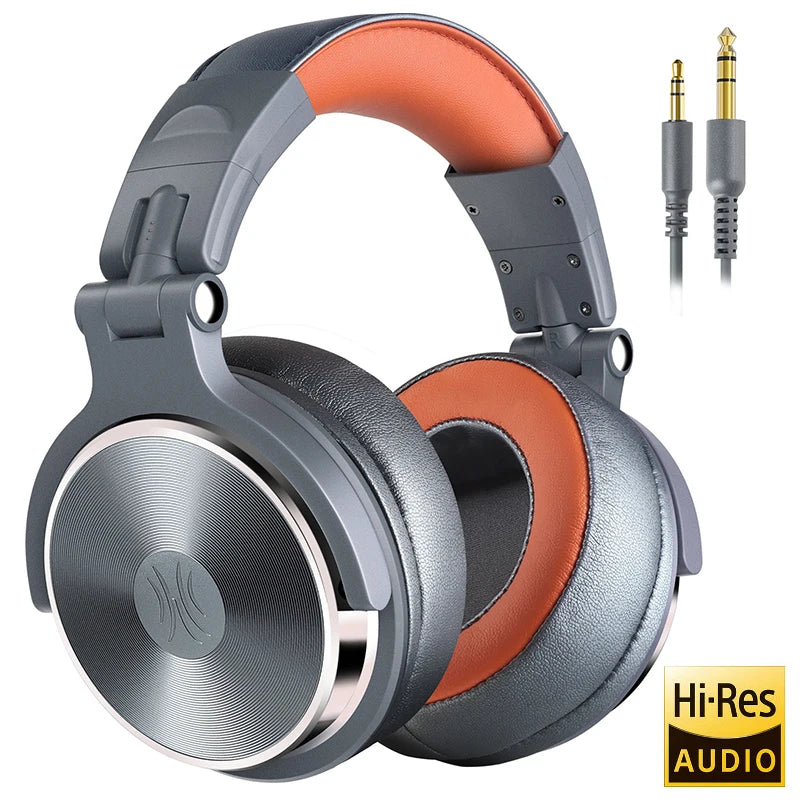 Grey and orange over-ear studio headphones with a swivel design, cushioned headband, and included audio adapters.